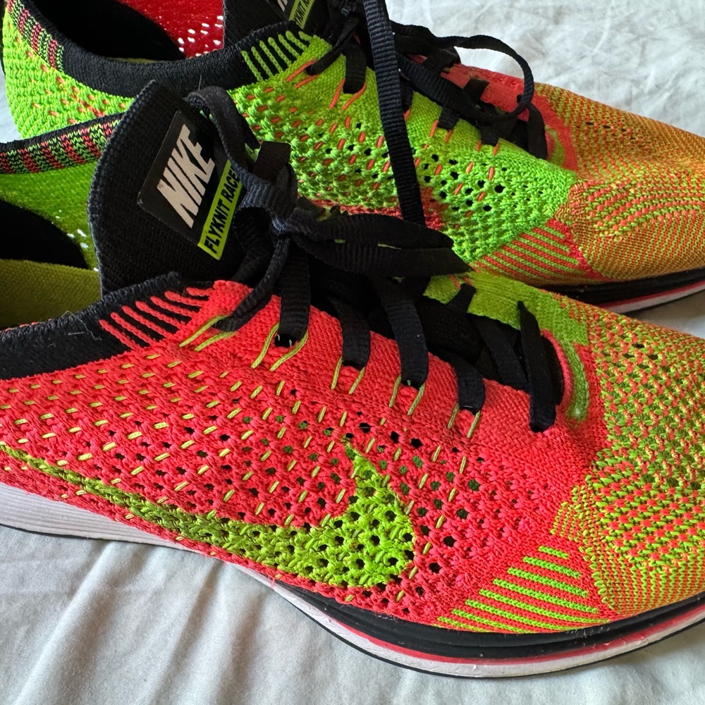 Nike Flyknit racer hyper punch/ volt size 6 men (fits size 7.5 women)
